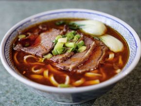 Beef Noodle Soup with Sliced Beef and Bok Choy